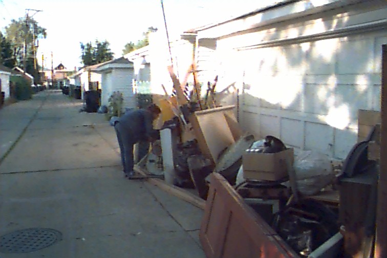 Material on apron of garage.